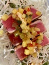 Seared tuna appetizer with pineapple salsa Royalty Free Stock Photo