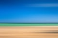 A seascape abstract with panning motion combined with a long exposure.  Image displays soft, pastel colors in a retro style Royalty Free Stock Photo