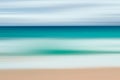 A seascape abstract with panning motion combined with a long exposure.  Image displays soft, pastel colors in a retro style Royalty Free Stock Photo