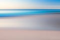 A seascape abstract with panning motion combined with a long exposure.  Image displays soft, pastel colors in a retro style Royalty Free Stock Photo