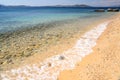 Seascape of Aegean sea with wave at sandy beach of Athos peninsula, Chalkidiki, Greece