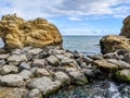 Seascape background with rocks in the summer season Royalty Free Stock Photo