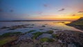 Seascape. Beach with rocks and stones. Low tide. Sunset time. Slow shutter speed. Soft focus. Melasti beach, Bali, Indonesia Royalty Free Stock Photo