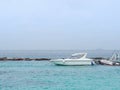 Seascape beautiful of bright blue sea surface with floating white speed boat