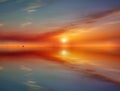 seascape sunset over sea blue sky gold pink yellow sunlight dawn sunbeams reflection on ocean water nature landscape
