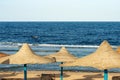 Sandy Beach and Straw Umbrellas - Red Sea Marsa Alam Egypt Africa Royalty Free Stock Photo