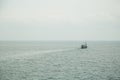 Seascape. boat on a quiet sea surface Royalty Free Stock Photo