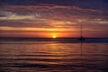 Seascape. Boat on sea. Sailboats at sunset. Ocean yacht sailing along water. Royalty Free Stock Photo