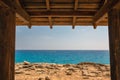 Seascape Cape Greco peninsula park in wooden frame, Cyprus Royalty Free Stock Photo