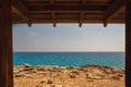 Seascape Cape Greco peninsula park in wooden frame, Cyprus Royalty Free Stock Photo