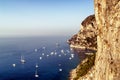 A seascape in Capri with moored boats in bay Royalty Free Stock Photo