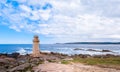 Seascape with cliff and lighthouse. Muxia Spain Royalty Free Stock Photo