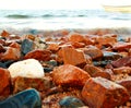 Seascape with colorful rocks, calm sea wave, fishing boat on the sea