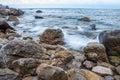 Seascape of the Crimean coast. Waves break into beautiful splashes against rocks. Royalty Free Stock Photo