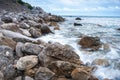 Seascape of the Crimean coast. Waves break into beautiful splashes against rocks. Royalty Free Stock Photo