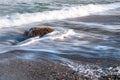 Seascape of the Crimean coast. Waves break into beautiful splashes against rocks. Royalty Free Stock Photo