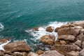 Seascape of the Crimean coast. Waves break into beautiful splashes against rocks. Royalty Free Stock Photo