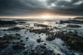 seascape with dramatic skies, showing microplastics in the water