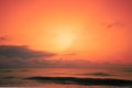 Seascape in early morning, orange sunrise over the sea Royalty Free Stock Photo