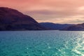 Seascape in the evening. View of the fjord. Rocky sea shore during sunset Royalty Free Stock Photo