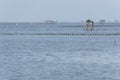 Seascape with fisherman hut in the sea in southern Thailand. Royalty Free Stock Photo