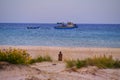 Seascape of a fishing boat in Maayan Zvi, Hof Hacarmel region Israel. Royalty Free Stock Photo