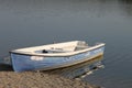 Seascape with fishing boat. Wooden row boat. Royalty Free Stock Photo