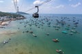 Seascape with fishing boats and cable car