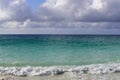 Blue ocean and cloudy sky. Seascape with a flat horizon line. View from the shore to the Indian Ocean. Royalty Free Stock Photo