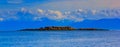 A seascape of Frederick sound, Alaska with small rocky island an Royalty Free Stock Photo