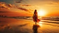 Seascape during golden sunrise with beautiful sky. Woman on the beach