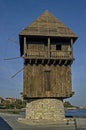 Seascape of isthmus with old wooden windmill between ancient Mesembria and new town Nessebar, Black Sea Royalty Free Stock Photo