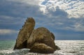 Seascape, large rocks in the sea on the backdrop of a cloudy sky, Crimea