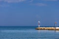 Seascape. The lighthouse at the church in the town of Faliraki in Greece on the island of Rhodes Royalty Free Stock Photo