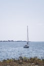 Seascape with a lone recreational boat in the open Sea Royalty Free Stock Photo