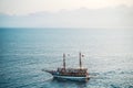 Seascape with a lonely ship in the Mediterranean. Boat trip on a tourist ship. Sights and travels of Turkey.