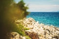 Seascape, Mediterranean coast. White rocks stones and blue water, sky with clouds Royalty Free Stock Photo