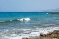 Seascape of the Mediterranean Sea with waves of the turquoise sea on the volcanic coast of Cyprus Royalty Free Stock Photo