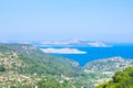 Seascape with Mediterranien sea, rocks and trees on sunny summer day. Royalty Free Stock Photo