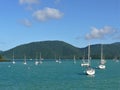 Seascape with mooring yachts, in the blurred background of the image Mountains,