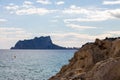 Moraria seascape with rock in the foreground and El PeÃ±on de Ifach in the background