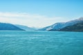 Seascape and mountain landscape on blue sky background in alaska Royalty Free Stock Photo