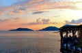 Seascape and natural Mediterranean landscape with cloudy blue sky and sunset in Lerici in Liguria, Italy