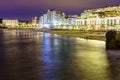 Seascape at night in Biarritz France in long photographic exposure. Beach and buildings at night in summer. France Royalty Free Stock Photo