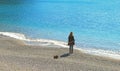 Seascape, paradise blue beach and natural summer landscape with lonely woman view from Tellaro in Liguria, Italy