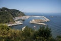 Seascape with parked boats captured in a coastal town of Cudillero in Spain Royalty Free Stock Photo