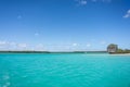 Seascape of Pines Island, new caledonia: turquoise lagoon, typical rocks, blue sky Royalty Free Stock Photo