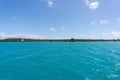 Seascape of Pines Island, new caledonia: turquoise lagoon, typical rocks, blue sky Royalty Free Stock Photo