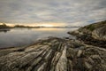 Seascape with rocks, sea and clouds. Grimstad in Norway Royalty Free Stock Photo