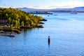 Seascape: sailboats in the harbor and buoy in water